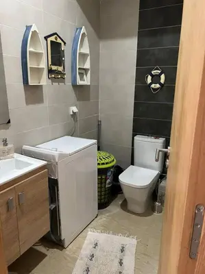 a bathroom with a toilet and a sink at BM Resort in Casablanca