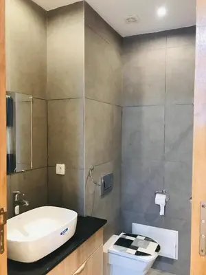 a bathroom with a sink and a toilet at THE luxurious and romantic pearl apartment in Mohammedia
