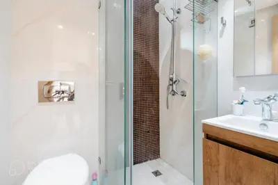 a bathroom with a shower and a sink at StayInn - Studio luxueux & cosy avec terrasse aménagée in Casablanca