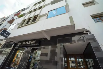 a building with a store in front of it at New Appartment in Rabat