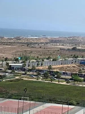 a view of a tennis court in a field at Zenata Tower in Casablanca