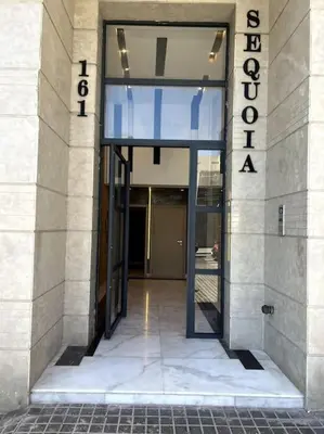 an entrance to a building with a sign on it at Best location, 2 minute to beach in Casablanca