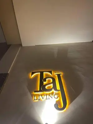 a lit up sign on a floor in a room at Luxury apartment 5 minutes Casablanca Airport in Nouaceur