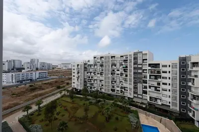 a view of a city with tall buildings at Très bel appartement bien situé Hayriad in Rabat