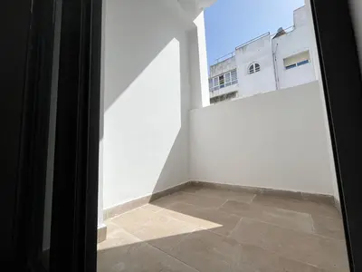 a room with a white wall and a tile floor at Comfy & Modern Studio at blv Anfa in Casablanca