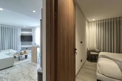 a hotel room with a bed and a bathroom at Casablanca Downtown 21 - By AppartAli in Casablanca