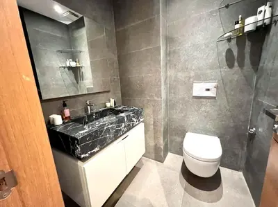 a bathroom with a toilet and a sink and a shower at Eden Luxury Anfa-Big Apt 3 Bedrooms/Massira Avenue in Casablanca
