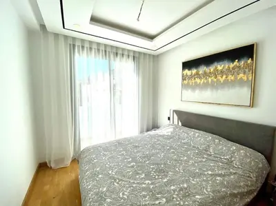a bedroom with a bed and a large window at Eden Luxury Anfa-Big Apt 3 Bedrooms/Massira Avenue in Casablanca