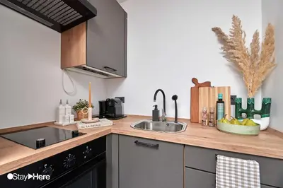 a kitchen with a sink and a counter top at Stayhere Casablanca - Maarif - Elite Residence in Casablanca