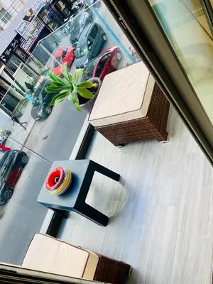 a table with a donut on it next to a window at Atlantic Suite View 3 in Casablanca