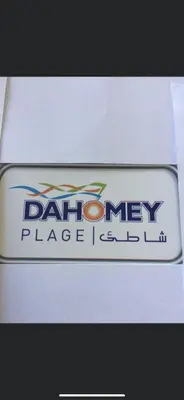 a box with a sign that readsdain memory place iceland at Bahia beach . Plage dahomey in Bouznika