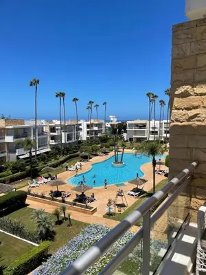 a view of a pool at a resort at Eden tamaris résidence in Dar Bouazza