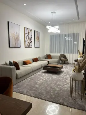 a living room with a couch and a table at Gorgeous 2 Bedrooms Apartment in Bourgogne in Casablanca