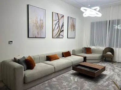 a living room with a couch and a coffee table at Gorgeous 2 Bedrooms Apartment in Bourgogne in Casablanca