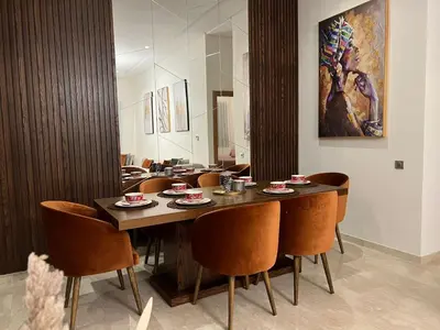 a dining room with a table and chairs at Gorgeous 2 Bedrooms Apartment in Bourgogne in Casablanca