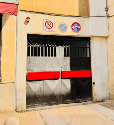 a pair of garage doors in a building at Luxury 3 Bedroom Apartment in the Heart of Agdal by MasterHost in Rabat