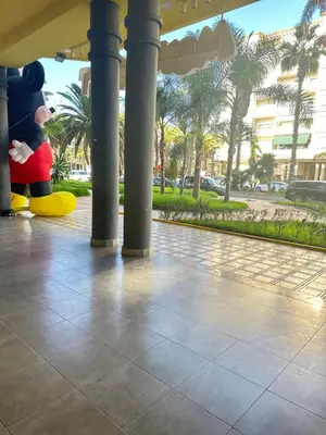 two stuffed animals are sitting under a building at App à côté du parc et corniche in Mohammedia