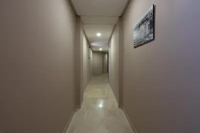 an empty hallway with a picture on the wall at Pop Art Studio-Location Journalière Casablanca in Casablanca