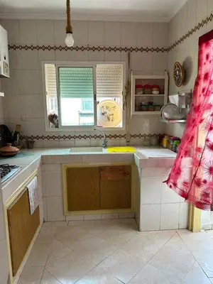 a kitchen with a sink and a window at Apparemment déjà vendu ne réserve pas in Azemmour