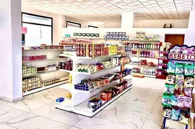 a store aisle with a lot of products on shelves at Appartement Casablanca in Dar Bouazza