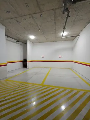 a large room with a yellow and white floor at Superbe Appartement Green Town in Oulad Lahsene