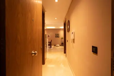 a hallway with a door leading to a room at Suite Apt Bourgogne N°2, 2 P in Casablanca