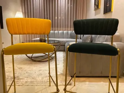 two yellow and black chairs in a living room at Glamorous Habous - By AppartAli in Casablanca
