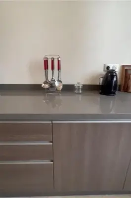 a kitchen counter with three spoons on top of it at 2 Bed Apartment - Balcony Parking Wifi in Casablanca
