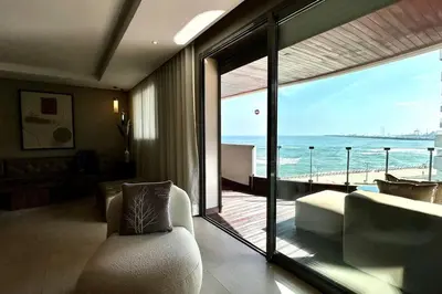 a living room with a view of the ocean at Marina State of Peace - Sea View in Casablanca