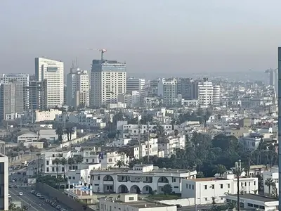 a view of a city with tall buildings and buildings at Panoramic View from 14th floor in Casablanca