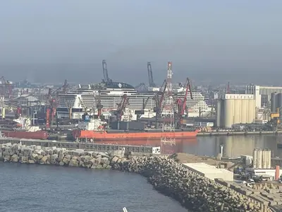 a large cruise ship is docked in a harbor at Panoramic View from 14th floor in Casablanca