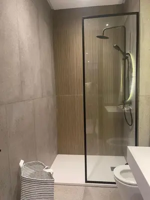 a bathroom with a shower and a toilet at Magic Appartement Luxury Gauthier 04 in Casablanca