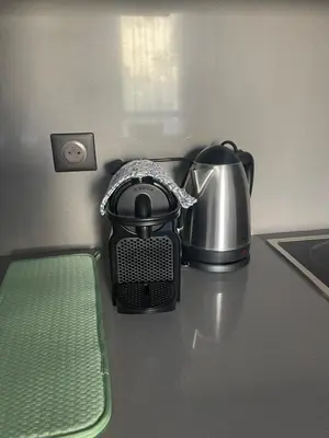 a tea kettle and a tea pot on a counter at Magic Appartement Luxury Gauthier 04 in Casablanca