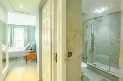 a bathroom with a shower and a toilet at Beautiful Moroccan apartment Casablanca Center in Casablanca