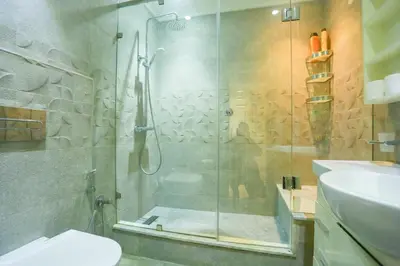 a bathroom with a shower and a toilet and a sink at Beautiful Moroccan apartment Casablanca Center in Casablanca