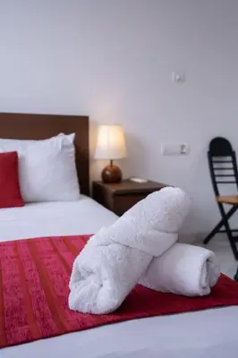 a stuffed animal on a bed in a hotel room at New urban getaway 25 in Casablanca