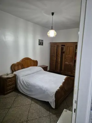 a bedroom with a large bed in a room at Welcome Loc T4 in Casablanca