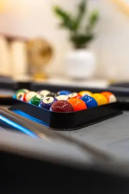 a tray of cue balls on a table at AeroSerenity in Nouaceur