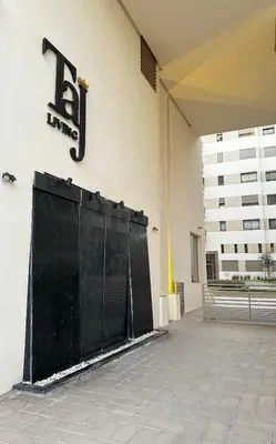 a sign on the side of a building at Take a cosy rest Near the airport in Nouaceur