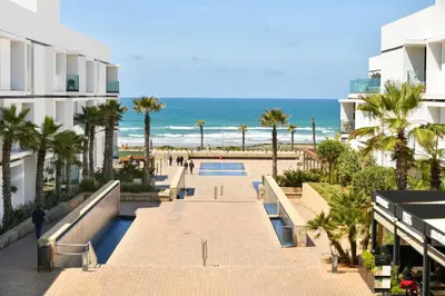 a view of the beach from a building at Ocean View Apartment - Anfa Place - in Casablanca