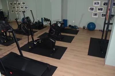 a gym with several exercise bikes on the floor at New Luxury apartment 5 min Casablanca Mohammed V Airport in Casablanca