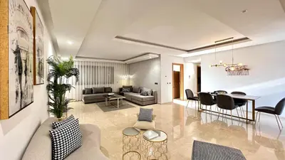 a living room with a couch and a table at Marvelous Center Spot - 3 Bedrooms in Casablanca