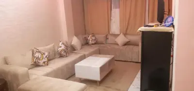 a living room with a couch and a table at Studio Zenith in Casablanca