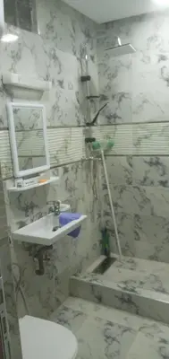 a bathroom with a sink and a mirror on the wall at Studio Zenith in Casablanca