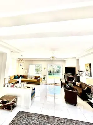 a large living room with couches and a couch at Oasis de Sérénité en Bord de Mer in Casablanca