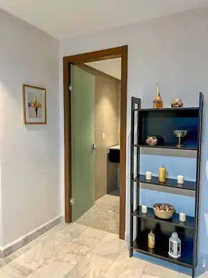 a room with a door and a shelf with items at Studio Haven in the Old Medina in Casablanca