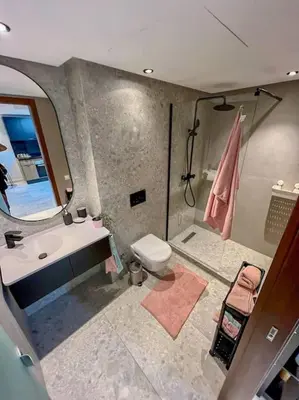 a bathroom with a sink and a toilet and a mirror at Studio Haven in the Old Medina in Casablanca