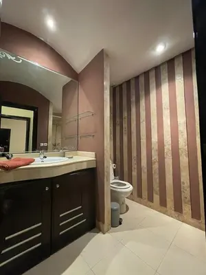 a bathroom with a sink and a toilet at Un bijou d'élégance au coeur du quartier Racine de Casablanca in Casablanca