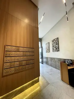 a hallway with a wall with writing on it at Modern Studio with Balcony & Parking Les Princesses 204 in Casablanca