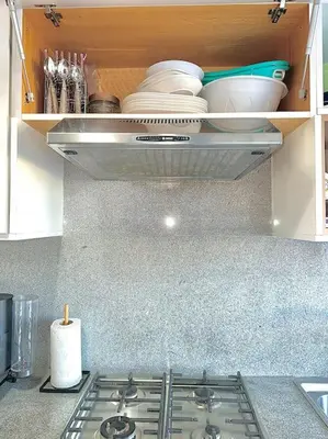 a kitchen with a stove top in a kitchen at Lilias Appart - 2 Mars in Casablanca